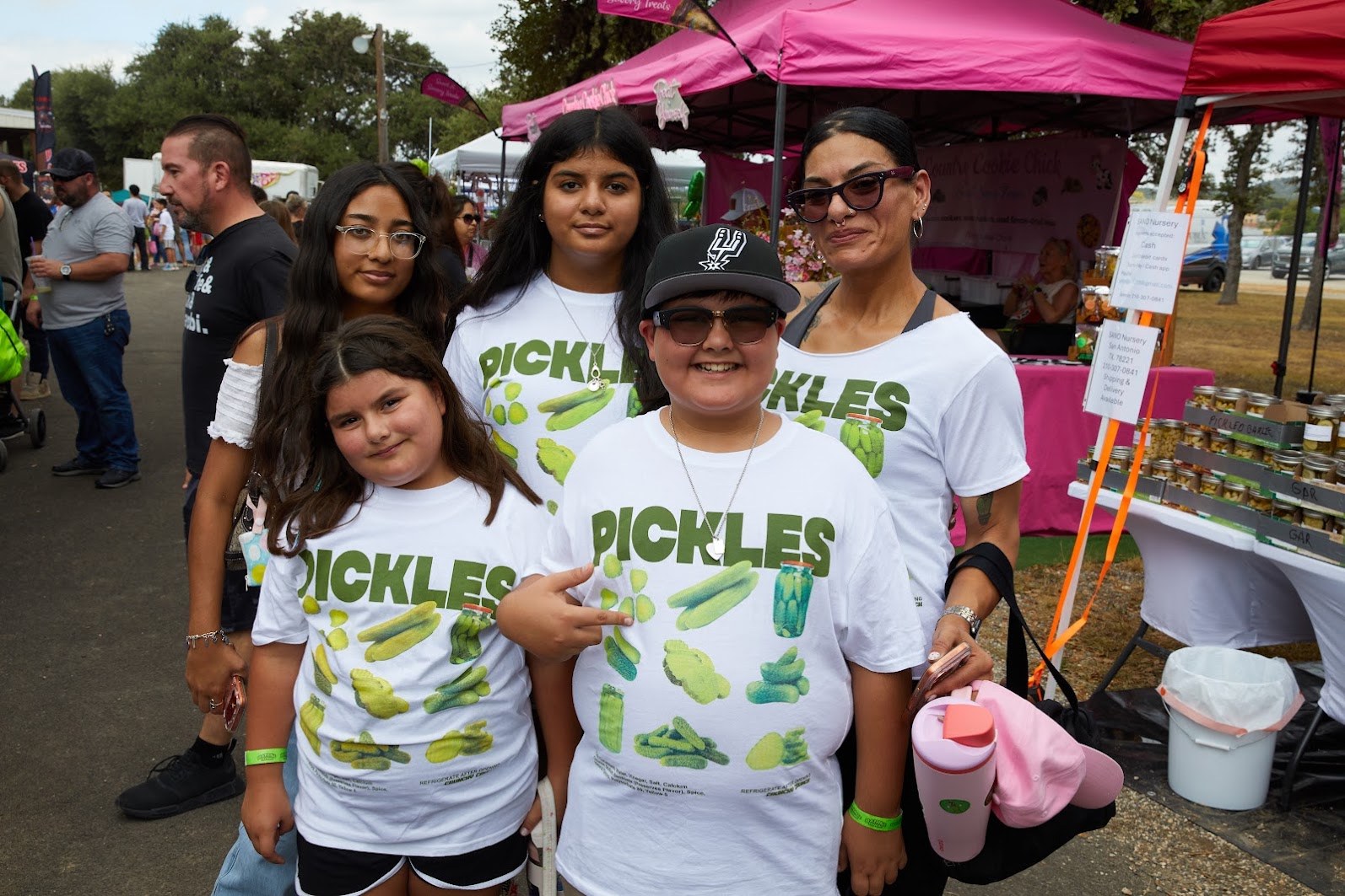 Friends in pickle shirts at the festival