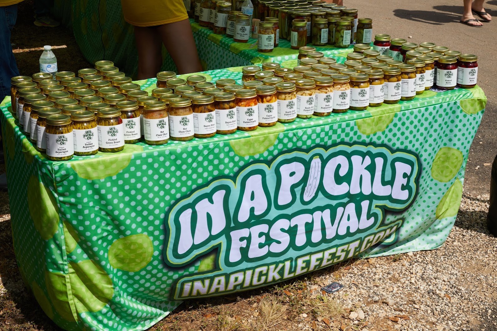 Pickle products at an In A Pickle Festival vendor booth