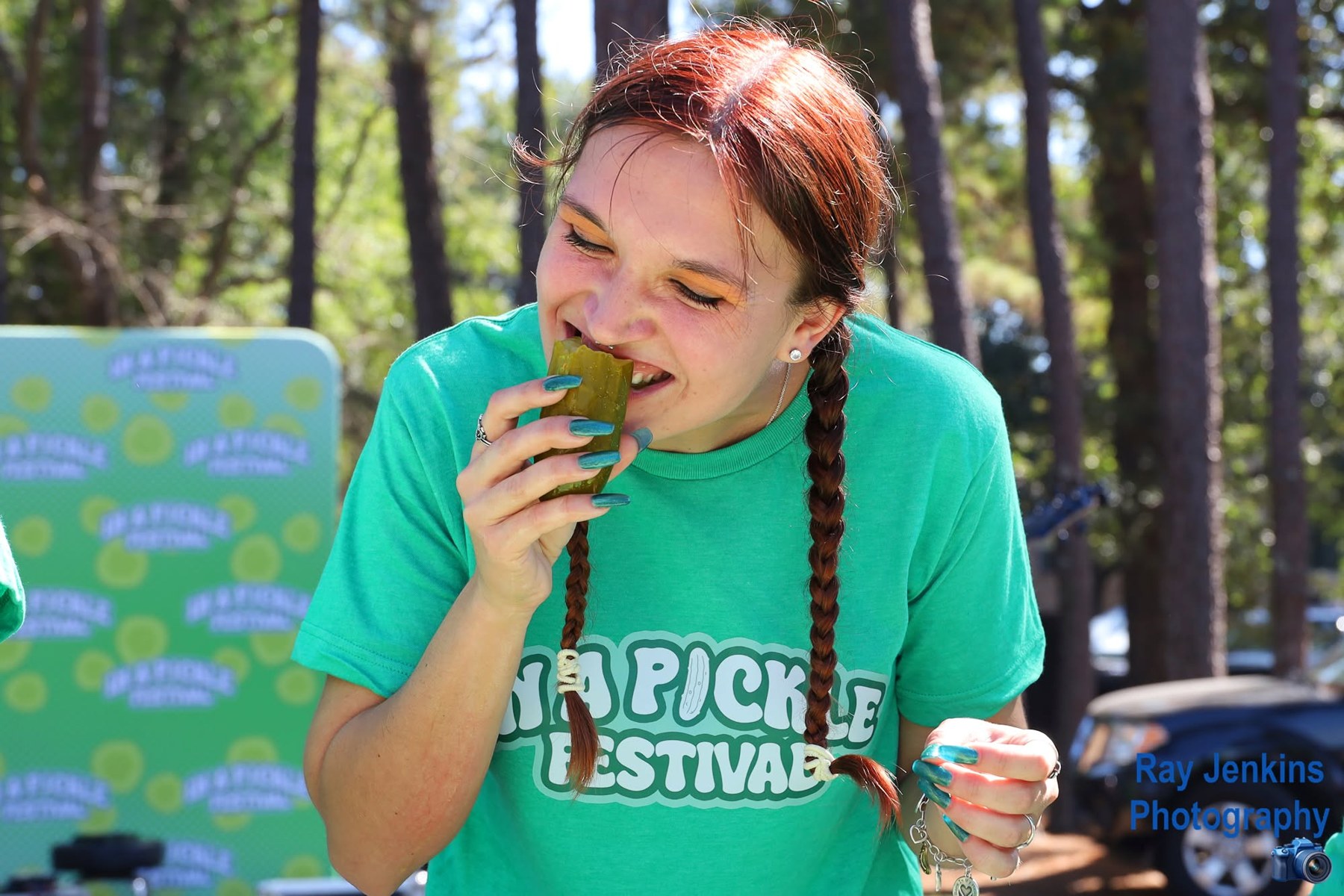 Contest participant eating a pickle